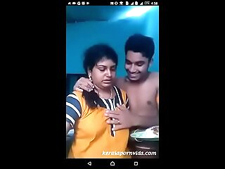 Kerala Adimali Malayalam 37 yrs senior married beautiful and hot housewife aunty’s (yellow nighty) boobs pressed by her 23 yrs senior unmarried illegal paramour Idukki Linu at the kitchen super hit viral porn video-1 @ 09.09&